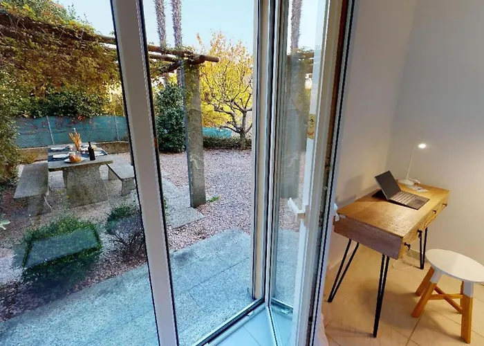 Casa Delle Vigne: Giardino, Pergola E Vista Appartement *